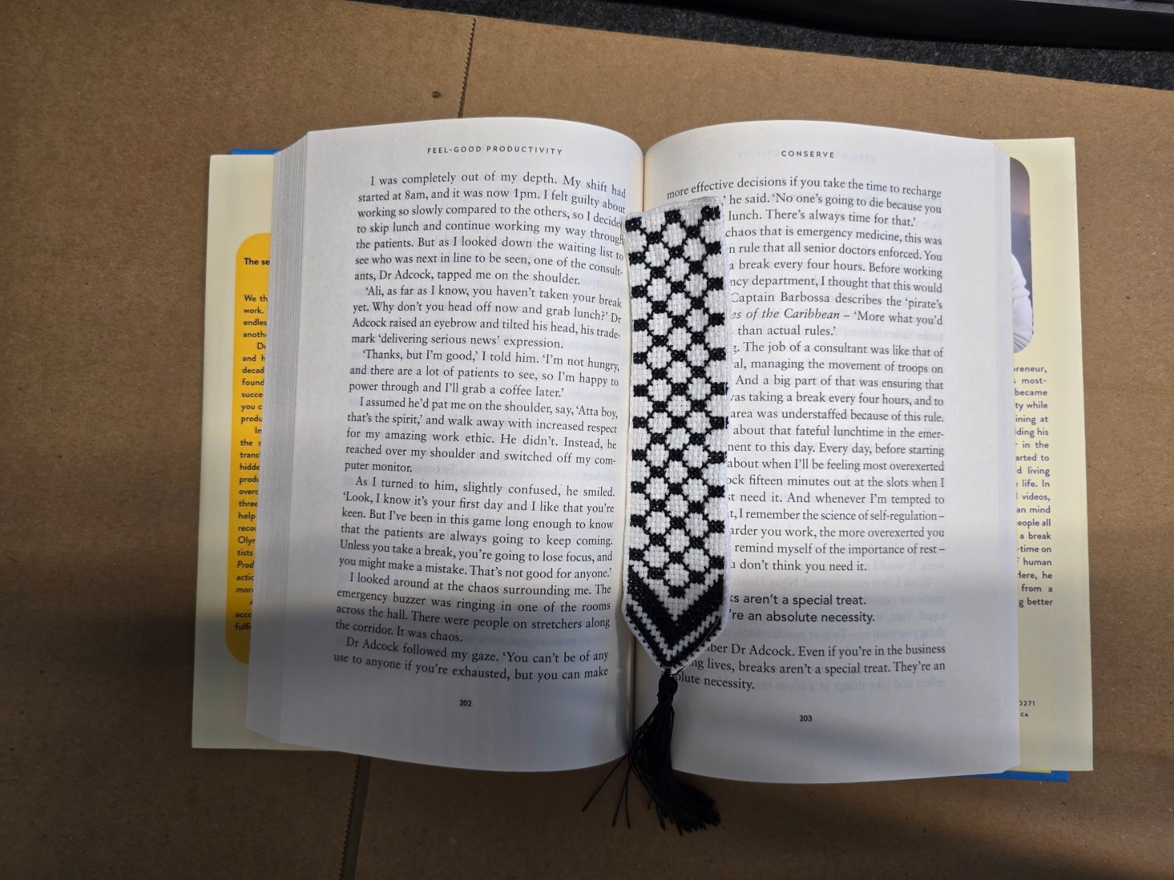 open book with a keffiyeh tatreez handmade bookmark rajaeen