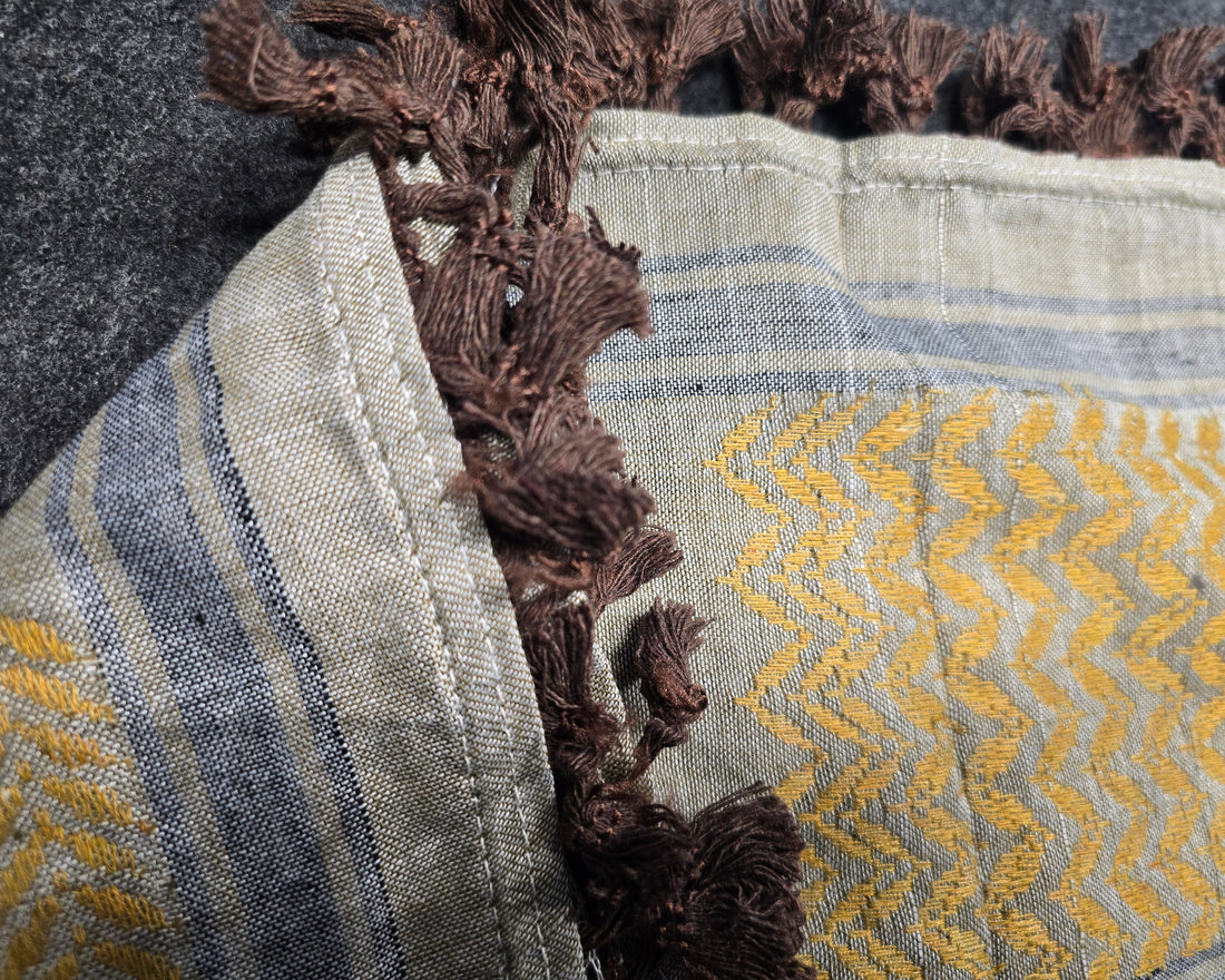 gold and white keffiyeh rajaeen