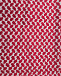 Red and white houndstooth pattern fabric texture