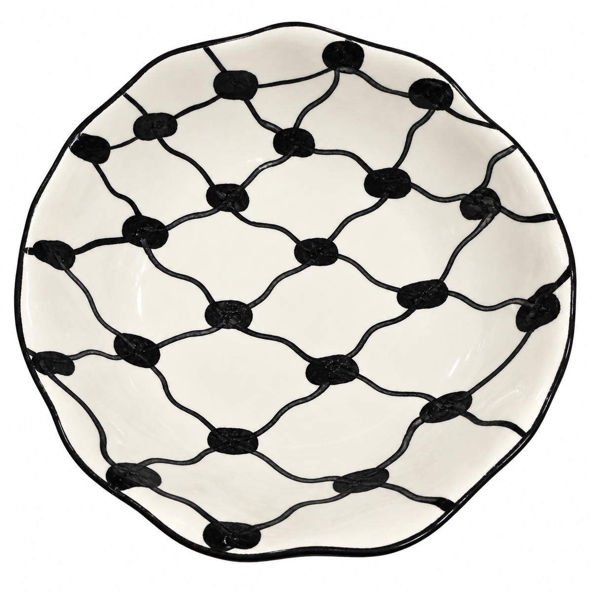 Candle in hand-painted keffiyeh ceramic bowl from Hebron, wax poured by Sondos Shureim in Nablus