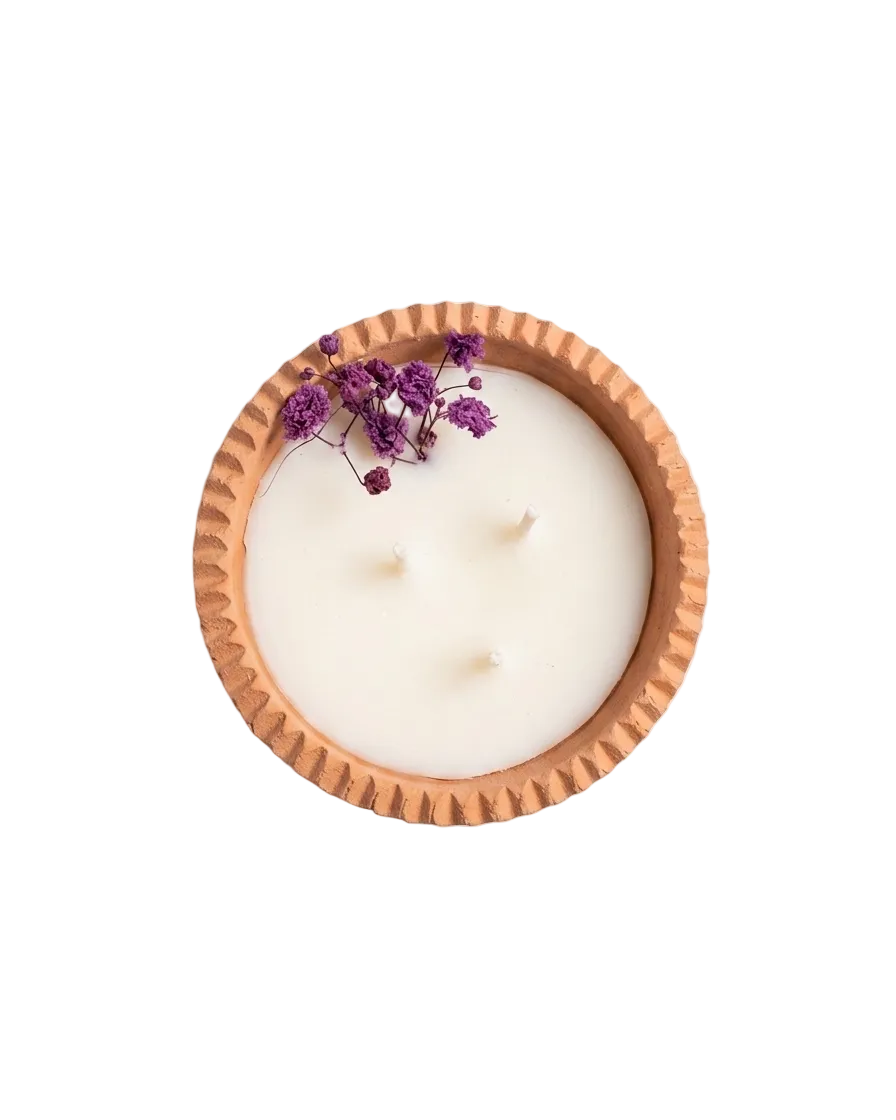 Candle in pottery bowl, hand-poured by Sondos Shureim in Nablus, Palestine