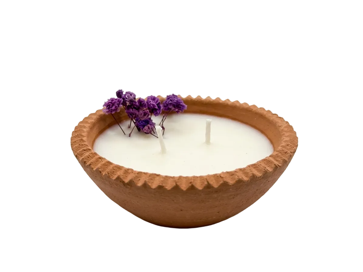 Candle in pottery bowl, hand-poured by Sondos Shureim in Nablus, Palestine